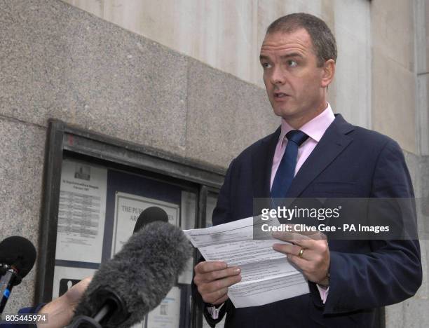 Detective Chief Inspector Mickey Gallagher reads a statement outside the Old Bailey, London, after Dr Edward Erin was found guilty of attempting to...