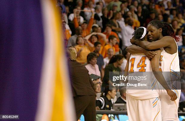 Nicky Anosike and Alexis Hornbuckle of the Tennessee Lady Volunteers celebrate after Hornbuckle scored the go ahead basket with less then one second...