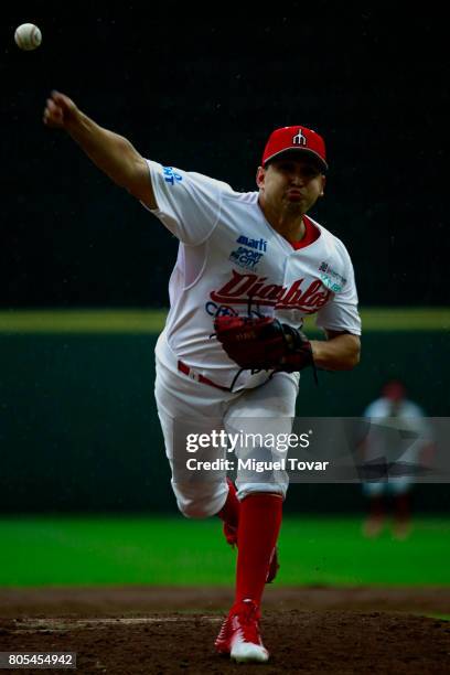 David Reyes of Diablos pitches during the match between Rojos del Aguila and Diablos Rojos as part of the Liga Mexicana de Beisbol 2017 at Fray Nano...