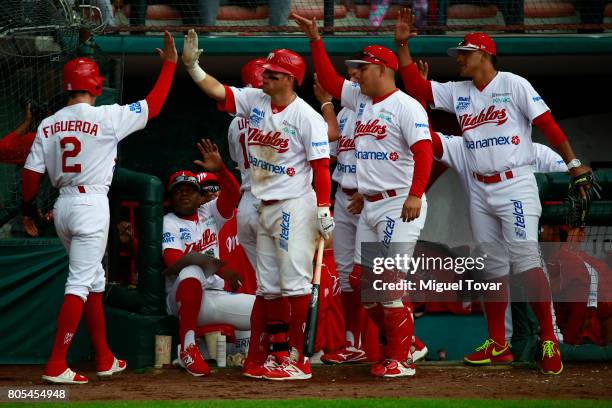 Carlos Figueroa of Diablos celebrates after scoring during the match between Rojos del Aguila and Diablos Rojos as part of the Liga Mexicana de...