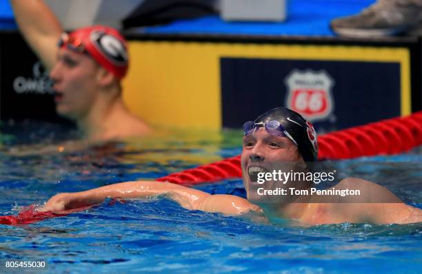 Abrahm DeVine celebrates after finishing second in the Men's 200 LC Meter Individual Medley Final during the 2017 Phillips 66 National Championships...