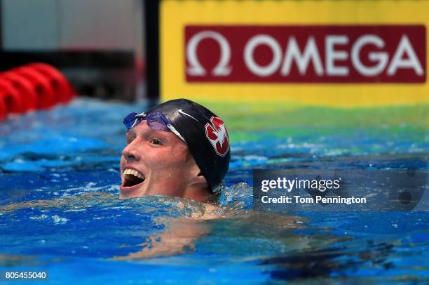 Abrahm DeVine celebrates after finishing second in the Men's 200 LC Meter Individual Medley Final during the 2017 Phillips 66 National Championships...