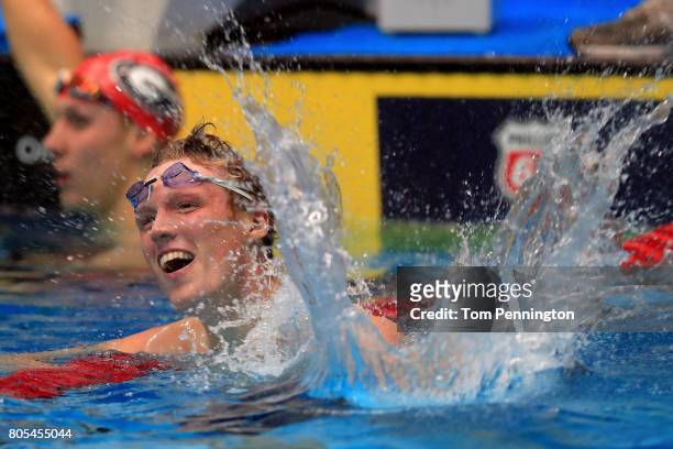 Abrahm DeVine celebrates after finishing second in the Men's 200 LC Meter Individual Medley Final during the 2017 Phillips 66 National Championships...