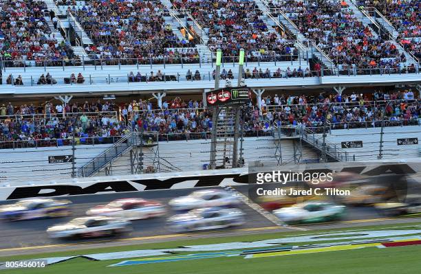 Cars race during the Monster Energy NASCAR Cup Series 59th Annual Coke Zero 400 Powered By Coca-Cola at Daytona International Speedway on July 1,...
