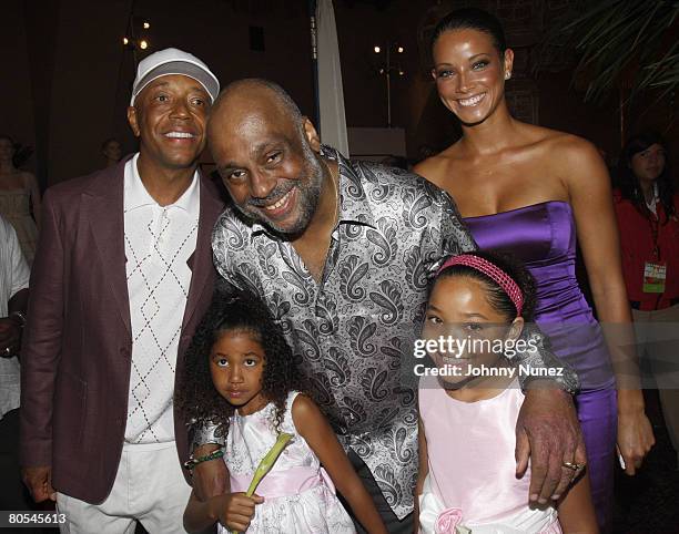 Russell Simmons, Aoki Lee Simons, Danny Simmons, Ming Lee Simmons and Porschla Coleman poses at the Russell Simmons Rush Philanthropic Arts...