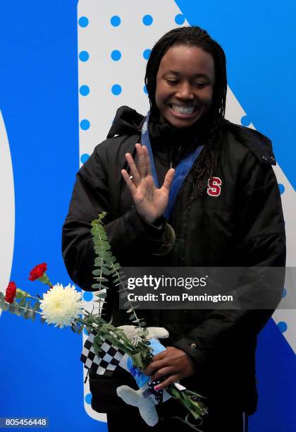 Simone Manuel celebrates after winning the Women's 50 LC Meter Freestyle Final during the 2017 Phillips 66 National Championships & World...