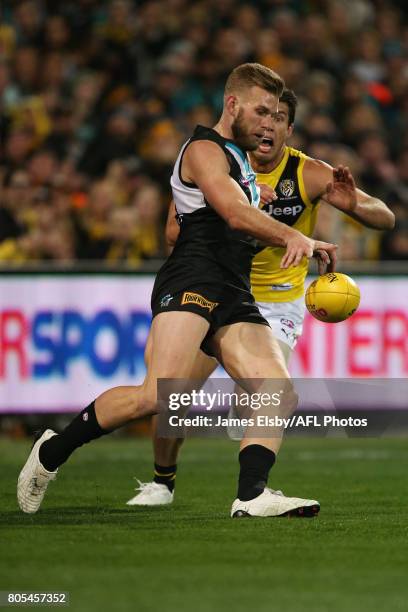 Jackson Trengove of the Power is tackled by Alex Rance of the Tigers during the 2017 AFL round 15 match between the Port Adelaide Power and the...