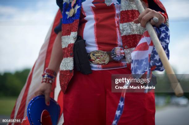 Helena Rodriguez wears a Donald Trump pin and patriotic clothing at the Gettysburg National Military Park on July 1, 2017 in Gettysburg,...