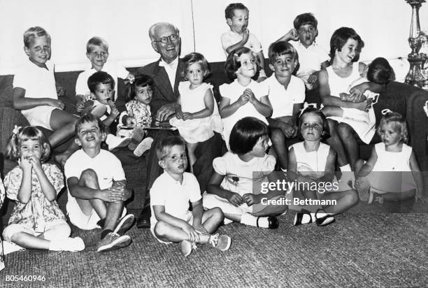 Gathering at the home of their grandfather to wish him a belated 'Happy birthday,' 17 of the grandchildren of Joseph P. Kennedy, father of the...