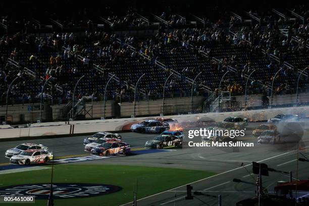 Drivers including Kyle Larson, driver of the Credit One Bank Chevrolet, Ryan Blaney, driver of the Motorcraft/Quick Lane Tire & Auto Center Ford,...