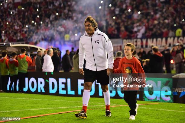 Former soccer player Enzo Francescoli enters to the pitch during Fernando Cavenaghi's farewell match at Monumental Stadium on July 01, 2017 in Buenos...