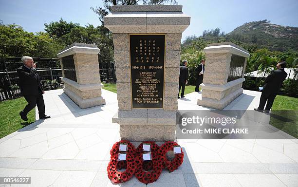 Visitors stroll the alleys of a war memorial in Hong Kong on April 07, 2008. The memorial which stands within the grounds of Stanley Military...