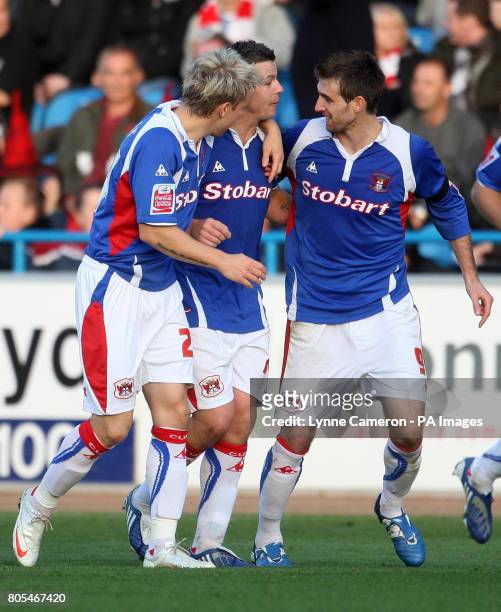 Carlisle's Ian Harte celebrates with teammates after scoring his sides first goal of the game from the penalty spot during the Coca-Cola League One...