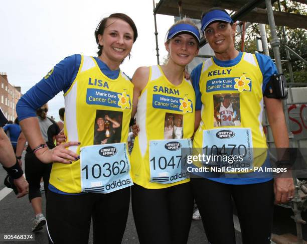 Friends of Jade Goody Lisa, Sarah and Kelly Reading, who were bridesmaids during her wedding to Jack Tweed, cross the finish line in the Dublin City...