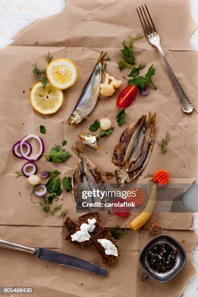 rustic snack with fish and mixed pickles - carolafink 個照片及圖片檔