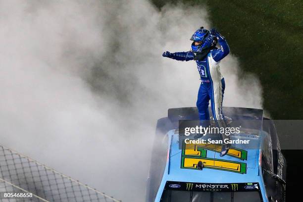 Ricky Stenhouse Jr., driver of the Fifth Third Bank Ford, celebrates winning the Monster Energy NASCAR Cup Series 59th Annual Coke Zero 400 Powered...