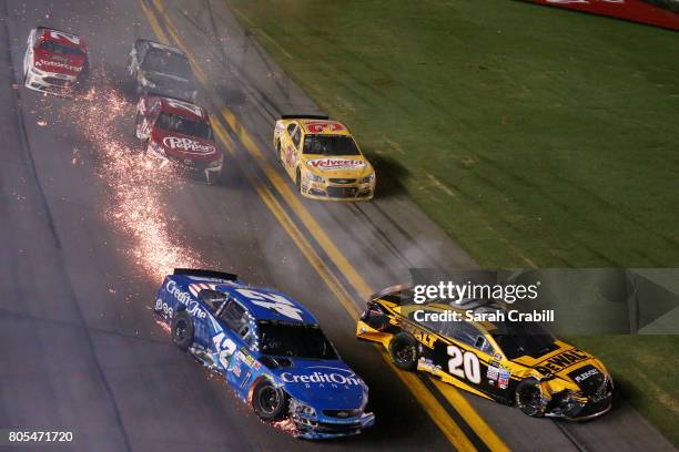 Kyle Larson, driver of the Credit One Bank Chevrolet, and Matt Kenseth, driver of the DEWALT Flexvolt Toyota, are involved in an on-track incident...