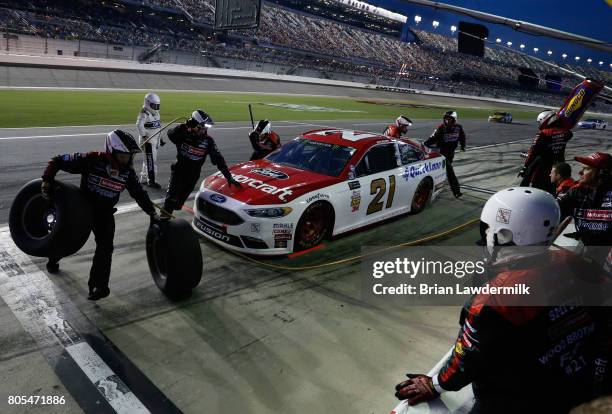 Ryan Blaney, driver of the Motorcraft/Quick Lane Tire & Auto Center Ford, pits during the Monster Energy NASCAR Cup Series 59th Annual Coke Zero 400...