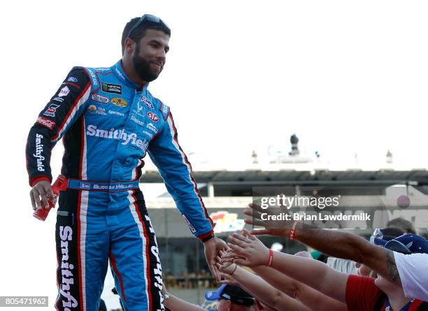 Darrell Wallace Jr., driver of the Smithfield Ford, is introduced prior to the Monster Energy NASCAR Cup Series 59th Annual Coke Zero 400 Powered By...