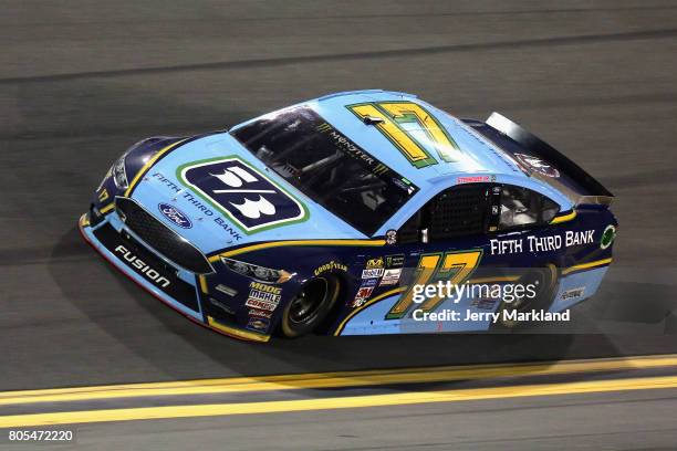 Ricky Stenhouse Jr., driver of the Fifth Third Bank Ford, races during the Monster Energy NASCAR Cup Series 59th Annual Coke Zero 400 Powered By...