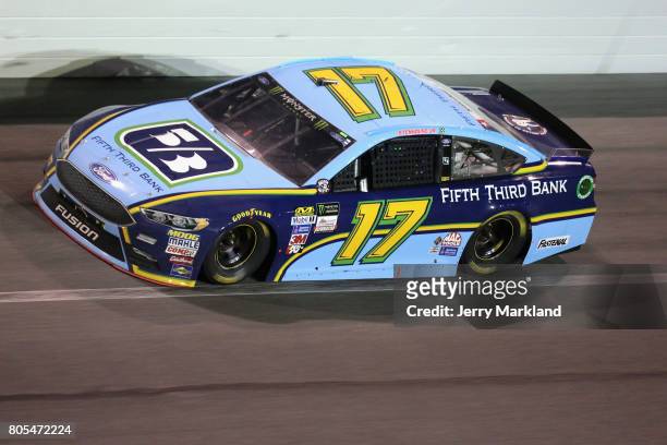 Ricky Stenhouse Jr., driver of the Fifth Third Bank Ford, races during the Monster Energy NASCAR Cup Series 59th Annual Coke Zero 400 Powered By...
