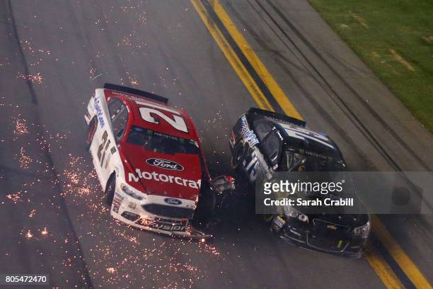 Ryan Blaney, driver of the Motorcraft/Quick Lane Tire & Auto Center Ford, is involved in an on-track incident with Brendan Gaughan, driver of the...