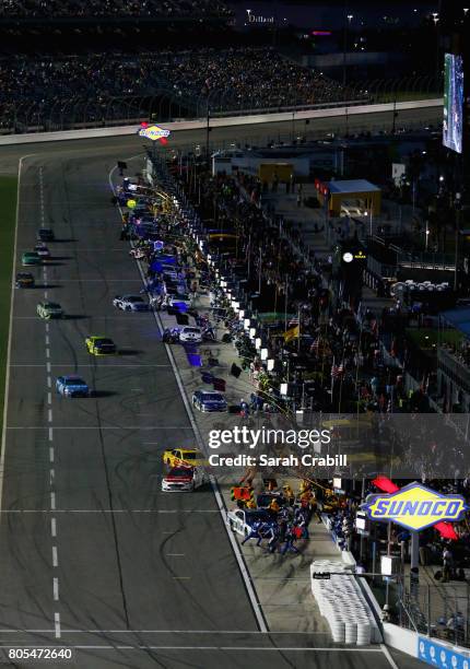 Cars pit during the Monster Energy NASCAR Cup Series 59th Annual Coke Zero 400 Powered By Coca-Cola at Daytona International Speedway on July 1, 2017...