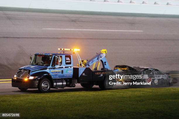 The Jimmy John's Ford, driven by Kevin Harvick , is towed off the track after being involved in an on-track incident during the Monster Energy NASCAR...