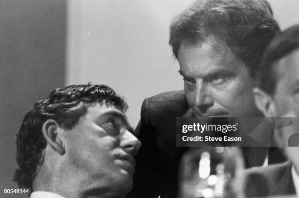 The leader of the British Labour Party, Tony Blair, talking to his colleague, the shadow chancellor, Gordon Brown, 1996.