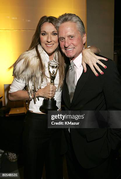 Celine Dion, winner of the Diamond Award, with Michael Douglas