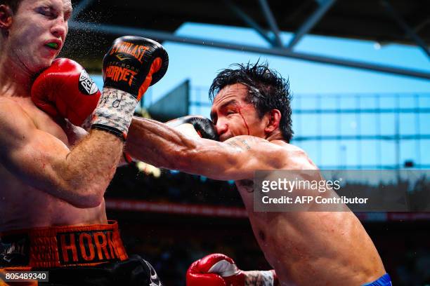 Manny Pacquiao of the Philippines fight Jeff Horn of Australia during the World Boxing Organization boat at Suncorp Stadium in Brisbane on July 2,...