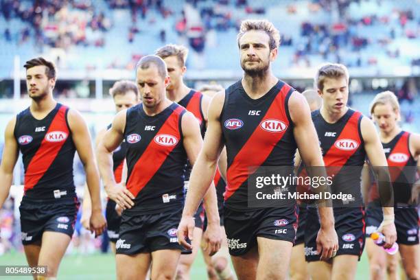 Jobe Watson of the Bombers looks dejected after defeat during the round 15 AFL match between the Essendon Bombers and the Brisbane Lions at Etihad...