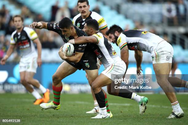 Bryson Goodwin of the Rabbitohs is tackled during the round 17 NRL match between the South Sydney Rabbitohs and the Penrith Panthers at ANZ Stadium...
