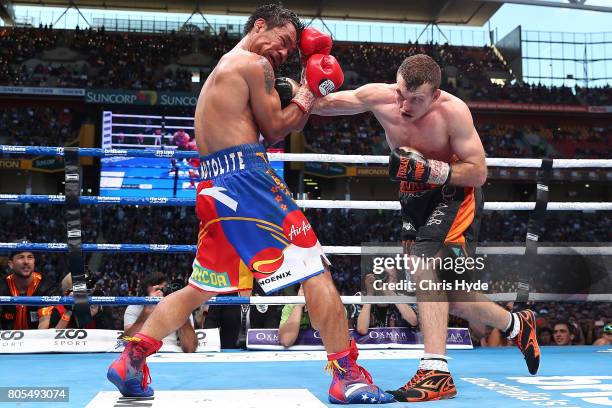 Jeff Horn of Australia punches Manny Pacquiao of the Philippines during the WBO World Welterweight Title Fight at Suncorp Stadium on July 2, 2017 in...