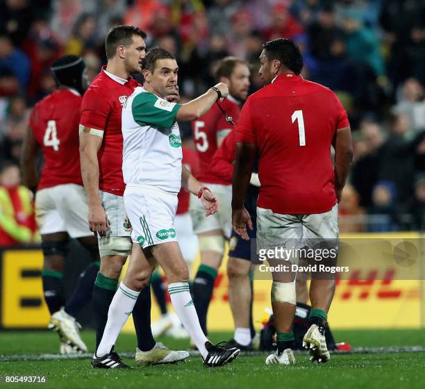 Jerome Garces, the referee, talks to Lions prop Mako Vunipola during the match between the New Zealand All Blacks and the British & Irish Lions at...