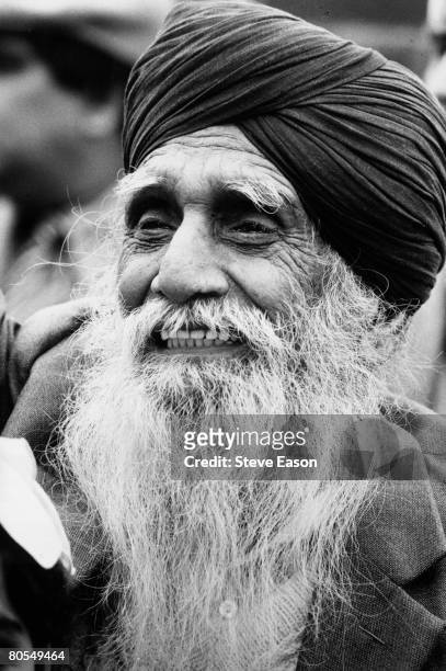 An elderly bearded Sikh man wearing a turban at a demonstration, September 1988.