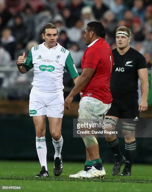 Jerome Garces, the referee, talks to Lions prop Mako Vunipola during the match between the New Zealand All Blacks and the British & Irish Lions at...