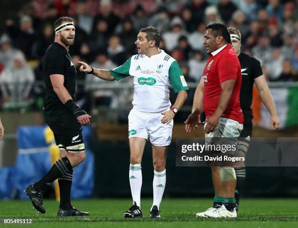 Jerome Garces, the referee, talks to Lions prop Mako Vunipola as All Black captain Kieran Read during the match between the New Zealand All Blacks...