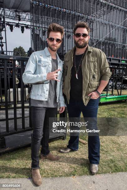 The Swon Brothers pose for a photo backstage at the 3rd Annual ShipKicker Country Music Festival at The Queen Mary on July 1, 2017 in Long Beach,...