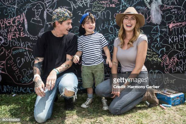 Diora Baird, Mav Viola and their son Otis Tango pose for a photo backstage at the 3rd Annual ShipKicker Country Music Festival at The Queen Mary on...