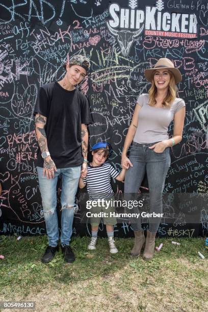 Diora Baird, Mav Viola and their son Otis Tango pose for a photo backstage at the 3rd Annual ShipKicker Country Music Festival at The Queen Mary on...