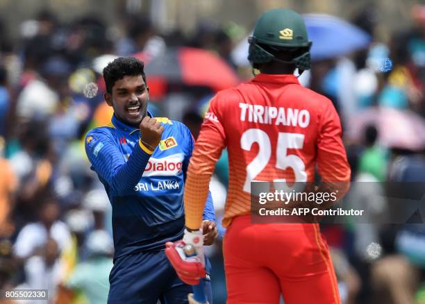 Sri Lanka's Wanidu Hasaranga celebrates after he dismissed Zimbabwe's Donald Tiripano during the second one-day international cricket match between...