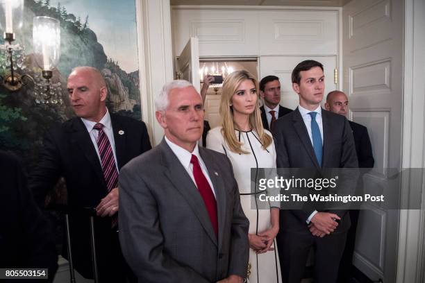 From left, Director of Oval Office operations Keith Schiller, Vice President Mike Pence, Ivanka Trump, daughter of President Donald Trump, and White...