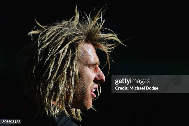 Dyson Heppell of the Bombers looks upfield during the round 15 AFL match between the Essendon Bombers and the Brisbane Lions at Etihad Stadium on...