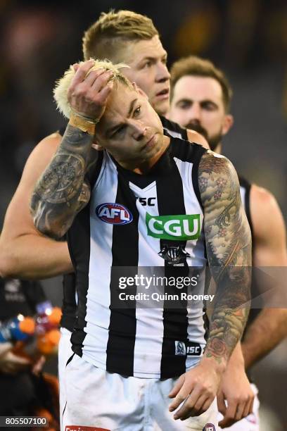 Jamie Elliott of the Magpies looks dejected after losing the round 15 AFL match between the Hawthorn Hawks and the Collingwood Magpies at Melbourne...