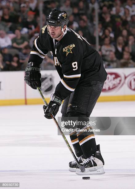 Mike Modano of the Dallas Stars looks to pass to a teammate against the San Jose Sharks at the American Airlines Center on April 6, 2008 in Dallas,...