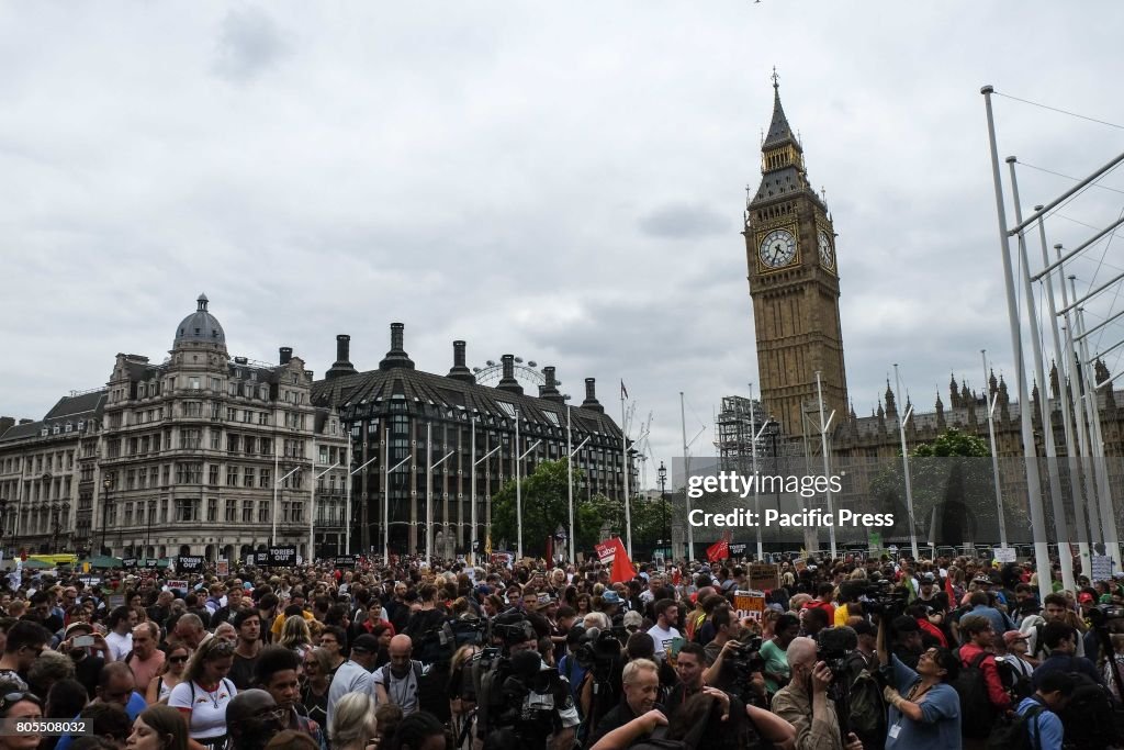 Thousands of protesters march through London and rally in...