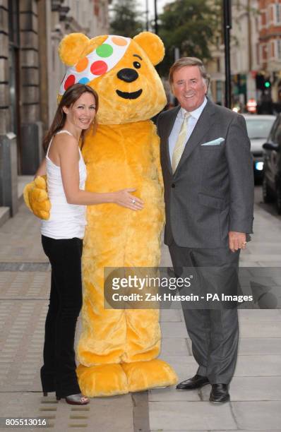 Pudsey Bear with Sharon Corr and Sir Terry Wogan during the launch of Children in Need's charity album, Bandaged Together, at the BBC Club on Great...