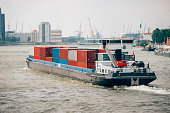 Barge with cargo containers