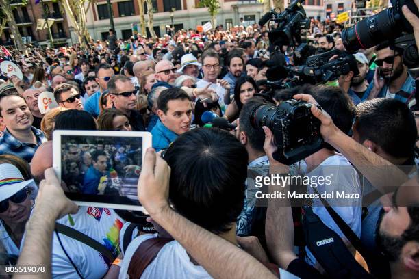 Albert Rivera, leader of Ciudadanos Party interviewed by the press during the demonstration of the WorldPride 2017. Behind him, Pablo Iglesias leader...